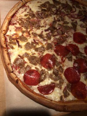 Sausage pepperoni pizza other half onion and sausage