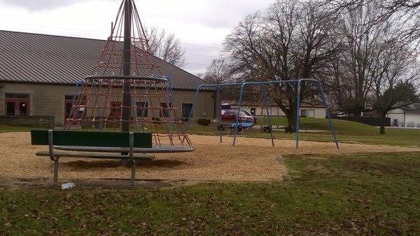 Spinning and swinging equipment at the playground