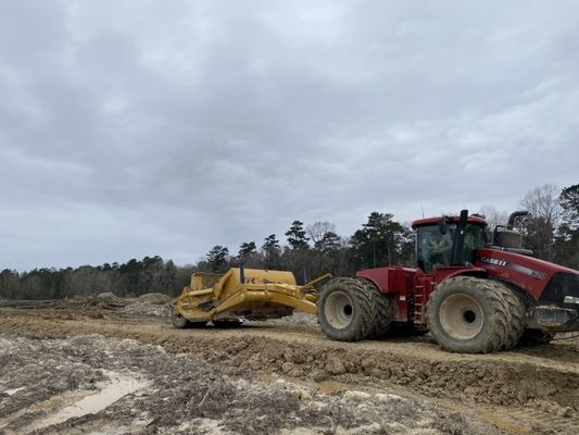 Patriot Industries - Heavy Civil, Mass Earth Moving w/ Tractors and Pan Scrapers.  WWW.lapatriot.net