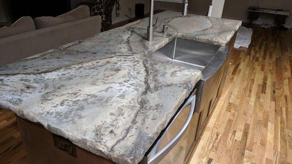 Concrete Kitchen Island with natural rock edge