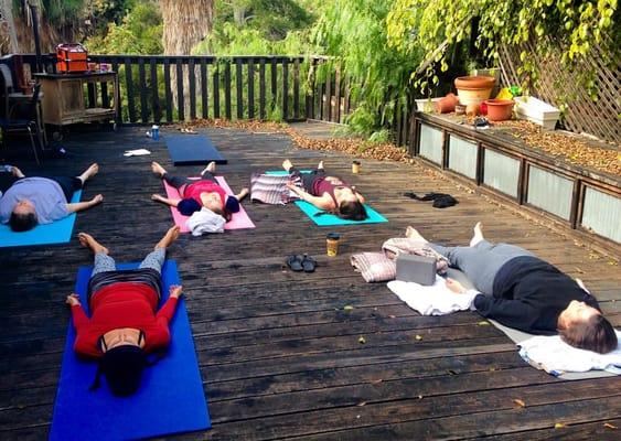 Backyard deck yoga in North Park