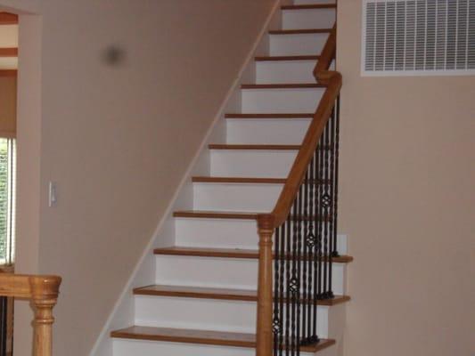 Stairs refinished, new railing