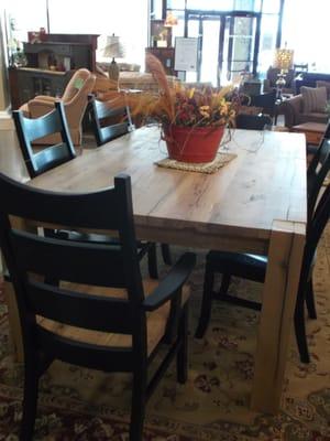 Living Room, Bedroom & Dining Room furniture in traditional finishes or one of a kind like this Reclaimed Lumber table with painted chairs!