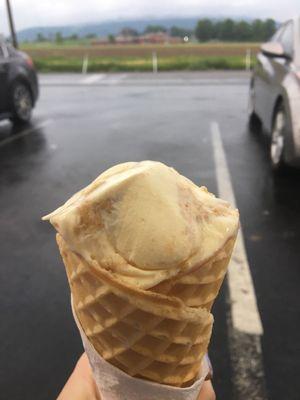 Graham cracker crumb cheesecake in a handmade waffle cone