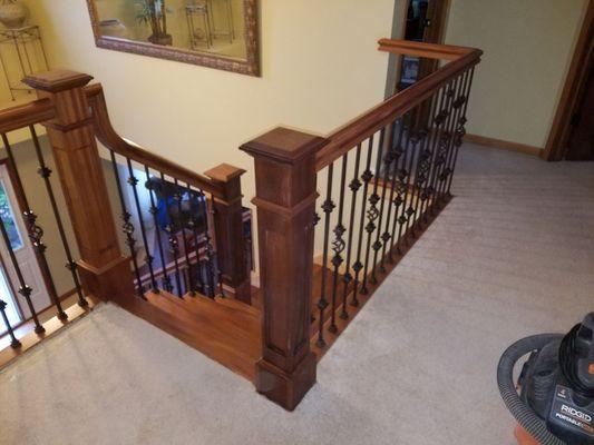 Exotic woods and iron balusters