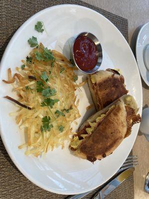 Cuban twist on the breakfast sandwich with awesome hash browns.