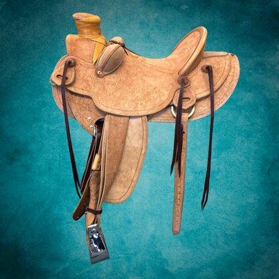 Custom Saddle #1102. This is a Wade saddle with a rough out look.