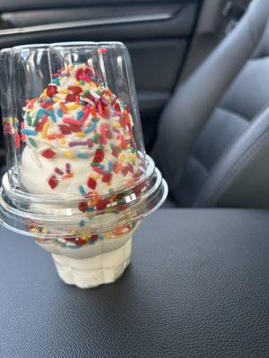 Vanilla Ice cream with sprinkles in a cup