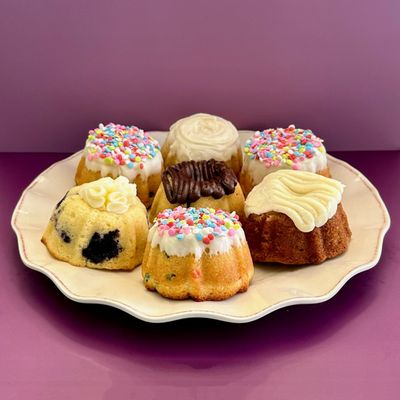 Bundt cakes in several flavors: Fun Fetti, Cinnamon Roll, Chocolate Chip, Blueberry Lemon, and Banana Bread