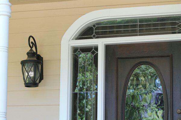 Special custom trim around the Front entry door. James Hardie siding by Home Exterior Systems, Houston, TX.