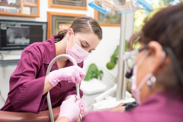 Helping a patient attain a beautiful smile.