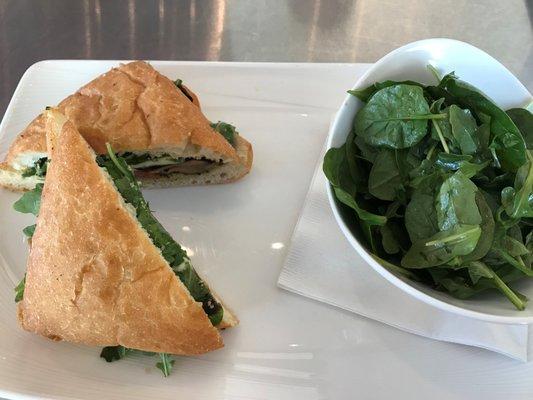 Pesto Portobello Sandwich with dressed greens