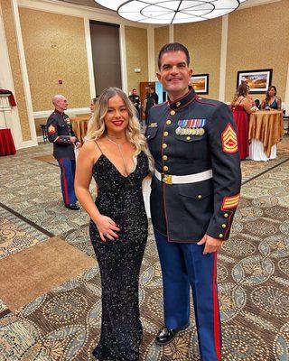 Me and my wife, my uniform dress blues and my wife's dress