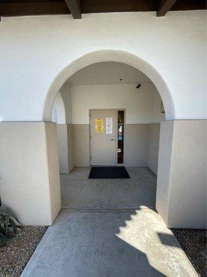 Front door to the school. Located at the back of the building on the left side.