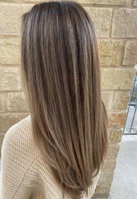 Full highlight toned down to a cool light brown