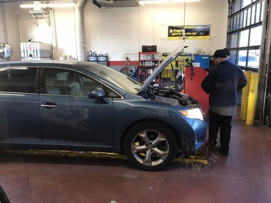 Lola is getting an oil change. (Yep, we name our cars!)