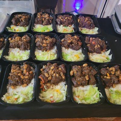 Oxtails, served with steamed cabbage and Jasmine Rice.