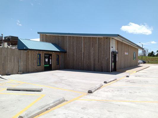 A recent photo of the newly-renovated exterior of the shop, taken during the daytime.