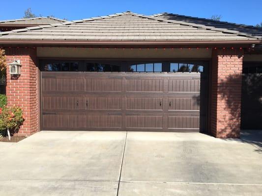 Factory finish walnut stained series 192, insulated garage door