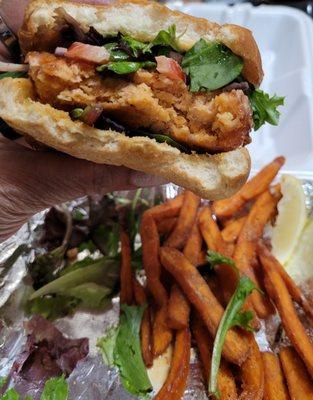 Salmon burger with sweet potato fries.