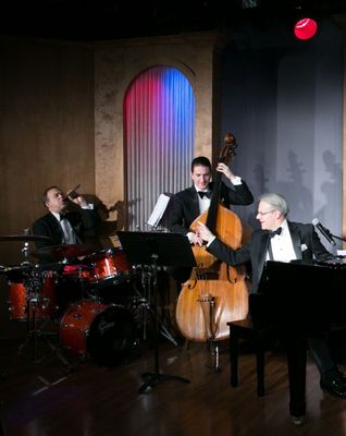 Most cabaret performances at The Q feature our band - Ken Remmert on drums, Ben Tervort on bass, and J. Kent Barnhart, pianist and emcee.