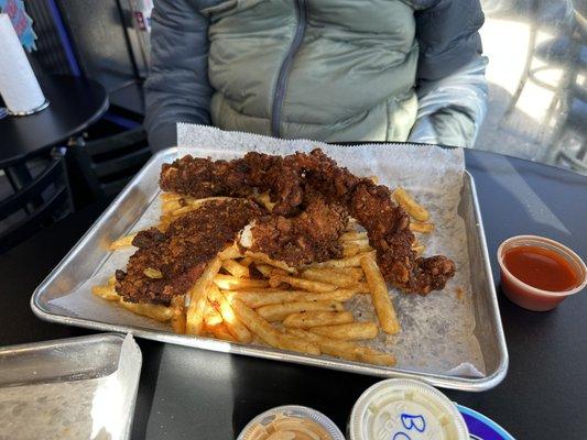 Here we have straight up spicy chicken tenders, with Buffalo sauce on the side.