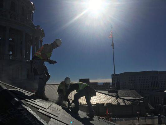 Hard at work on the roof of the Denver Capitol Building