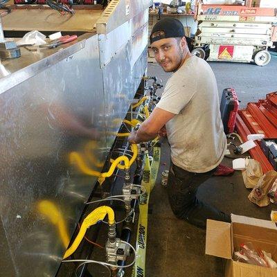 Jack working on a custom burner assembly