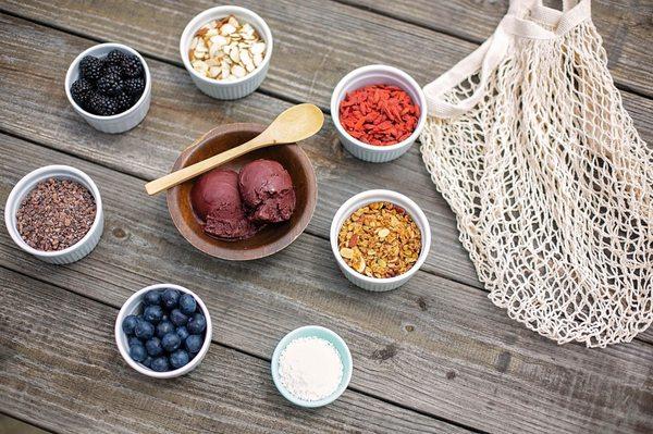 Acai sorbet topped with fresh fruit and super food toppings!