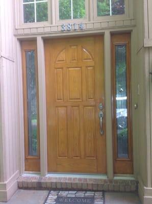 Fiberglass door with finial coat of finish. The door has been totally refinished.