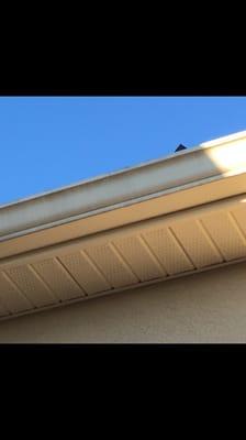 Shingle peeking out f my gutter after roof work