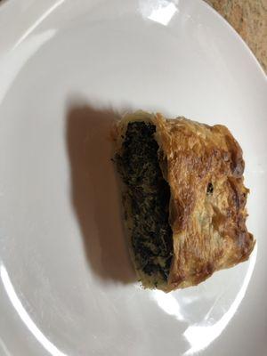 Half of a spinach pie