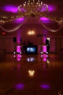 The Alpine Country Club bathed in hot pink lighting.