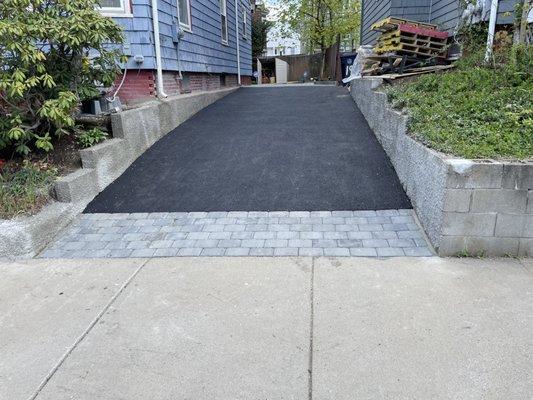 Asphalt driveway with paver entrance