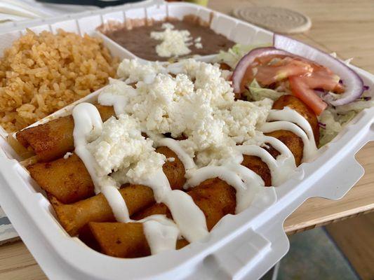 Red chicken enchilada plate- delicious, flavorful, and very generous portions!