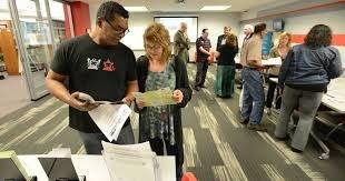 Coworkers in new office space Naperville