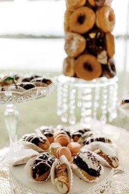 Macarons, cannolis, donuts, assorted pastries