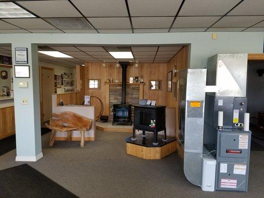 Showroom featuring fireplaces.