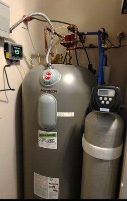 Marathon water heater with lifetime warranty from Mfg.along with whole house water filter and descaler.