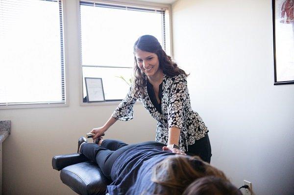 Dr. Shelby Preston doing Decompression on patient at MVP Chiropractic and Physical Therapy in New Lenox