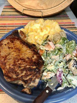 Choice steak $7.59. (Ea) Idaho potato at 99¢ a pound mixed green salad $4