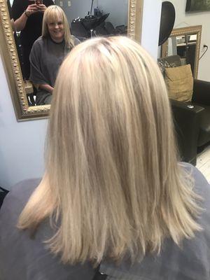 Client wanted ultralight blonde hair.  Stylists kept taking her into a gold base with yellow hilights. Let's just say she was VERY HAPPY. :)