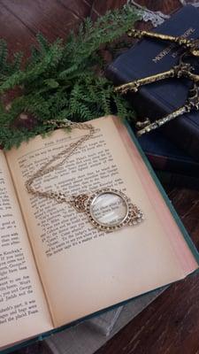 Vintage-inspired magnifier glass necklaces available at www.1928.com. Great for reading small print, text and menus.