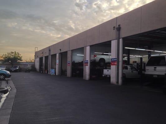 4th garage on your right. See the blue Smog Check sign on the ground? Park there. :)