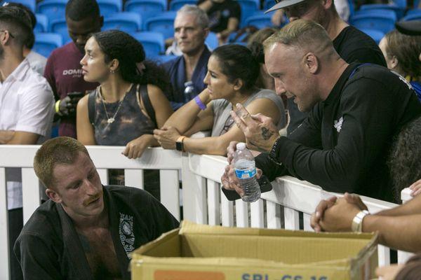 Professor Nate Mendelsohn also giving some between match advice at BJJ Tour 2023