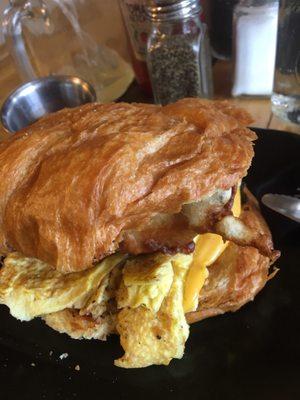 Chance Sandwich - Egg, cheese, fried bacon, sausage, hot sauce on side served on croissant.