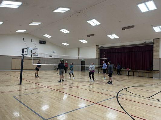 Playing volleyball in the large gym