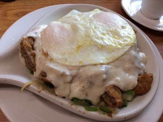 Southerner Skillet - chicken fried steak with sausage gravy and eggs over easy. Fantastic!!