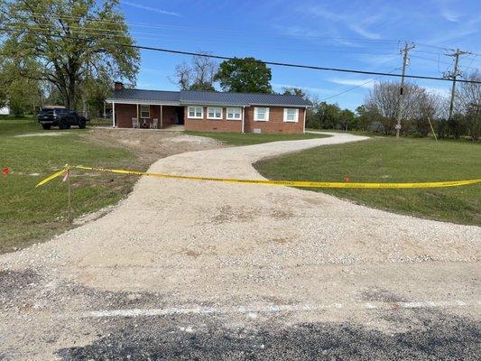 Crushed concrete driveway.