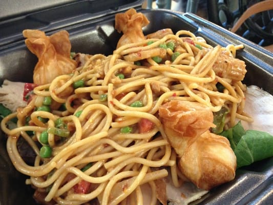 Spicy Thai peanut noodles with grilled chicken and a side of shrimp purses.  Yum!